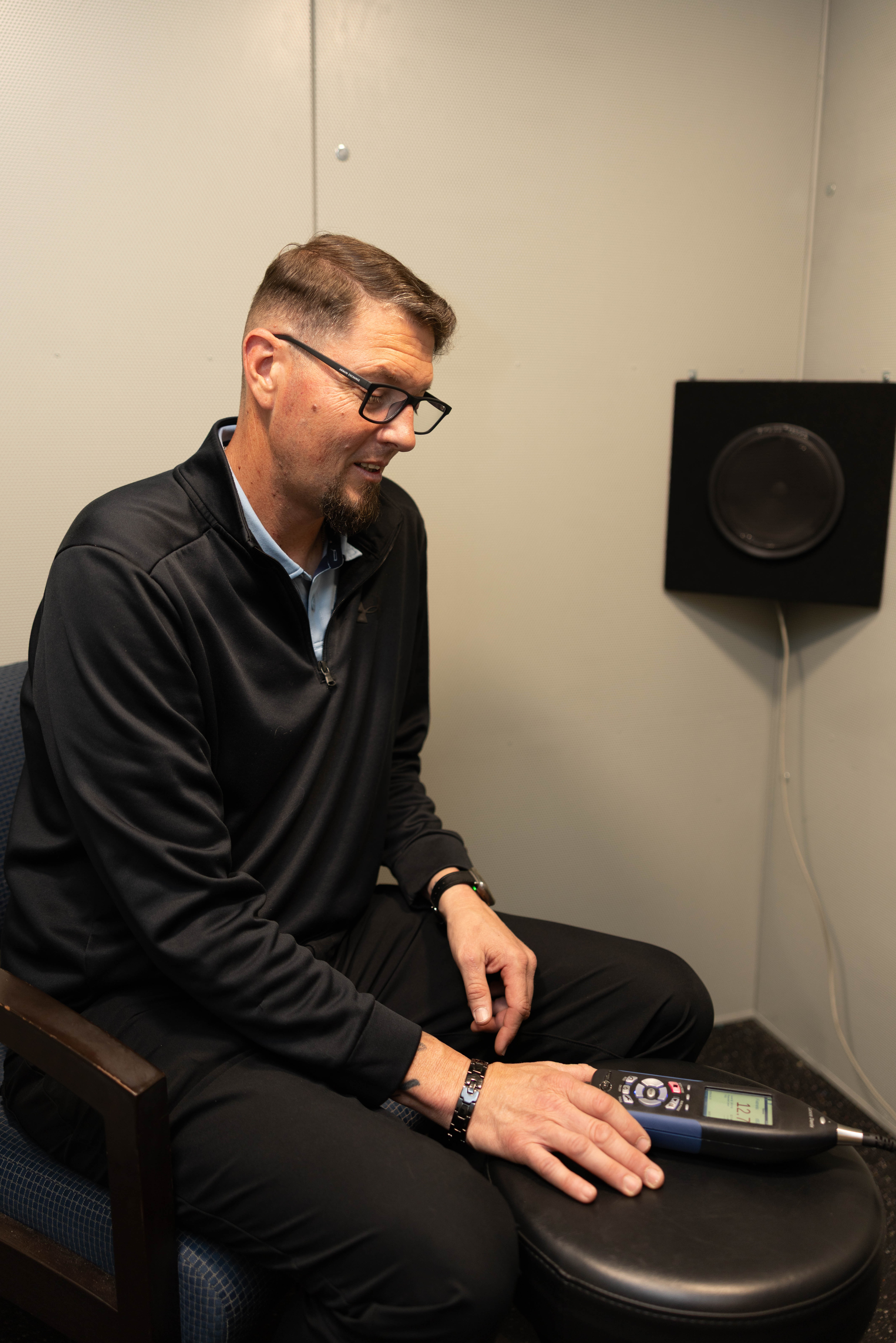 On-site audiology equipment verification in progress at a practice